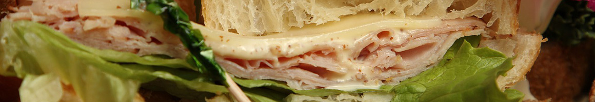 Eating Sandwich at Classics Sandwiches & Subs restaurant in Richmond, VA.